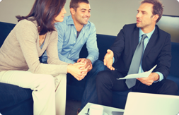 couple meeting with insurance agent